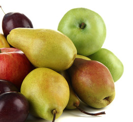 Pears with apples and plums isolated on white