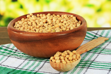 Soy beans on table on bright background