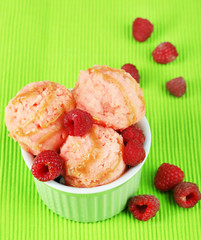 Delicious ice cream in bowl close-up
