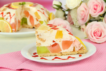 Delicious jelly cake on table close-up