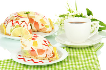 Delicious jelly cake on table on white background