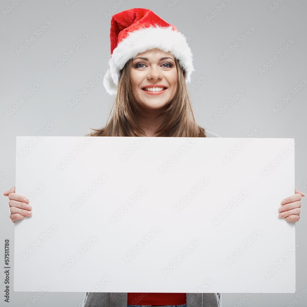 Wall mural woman christmas portrait hold white banner. santa christmas hat