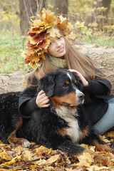 girl with dog sitting