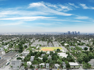 Residential neighborhood with cityscape background.