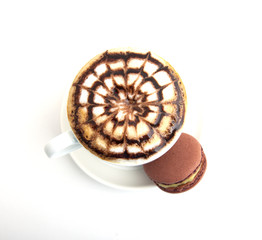 A cup of cappuccino with cookies