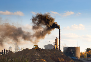 Smoke from  pipes of oil refinery - obrazy, fototapety, plakaty