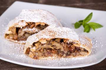 Slice of an apple strudel on a plate