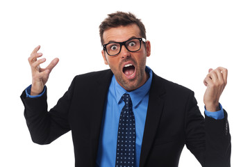Angry businessman screaming very loud