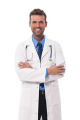 Portrait of candid male doctor .