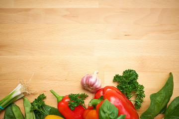 healthy organic vegetables on a wood background