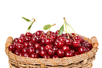 Sweet juicy cherry in basket