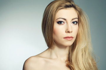 Fototapeta premium Portrait of a beautiful young blonde woman with a great make-up