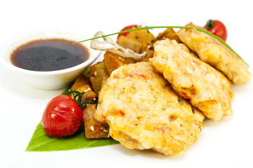 shrimp patties of meat with a salad