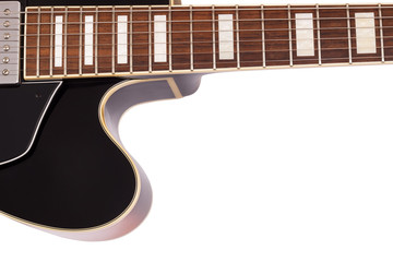 Close-up of vintage electric jazz guitar on white background