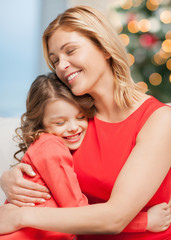 hugging mother and daughter