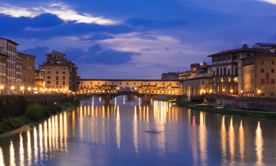 Fototapeta na wymiar Night view of Ponte Vecchio over Arno River in Florence, Italy