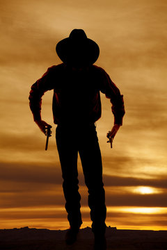 cowboy silhouette two guns