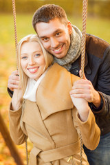 Obraz premium romantic couple in the autumn park
