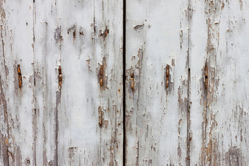 old wooden and grungy locked door