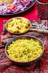 Chicken curry with basmati rice and green peas, dish popular