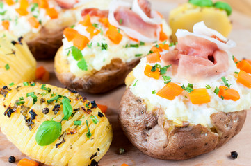 Sliced and stuffed potatoes