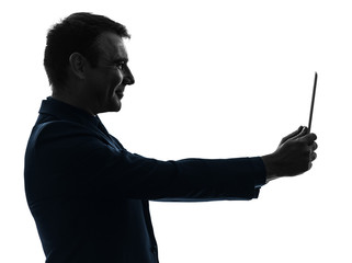 business man  digital tablet smiling  silhouette
