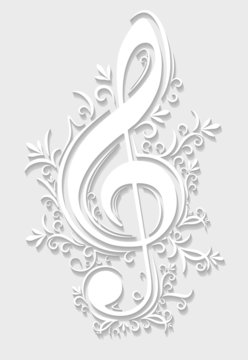 Abstract musical background with treble clef in cut of paper sty