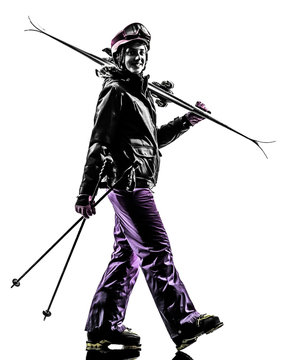 one woman skier  walking silhouette