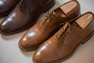Brown men's shoes and shoe stratchers