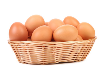 Brown eggs in the basket.
