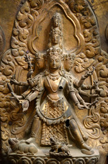 Fototapeta na wymiar Brazen relief of Shiva the destroyer in Durbar square. Nepal