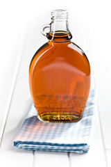 maple syrup in glass bottle