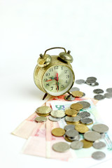 Time is money & The ancient clock and some money