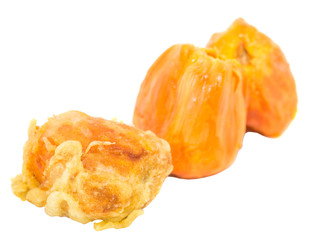 Fresh and fried chempedak arils over white background.