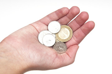 Fototapeta premium Hand holding few coins