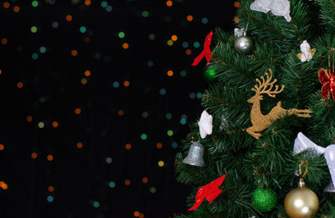 Christmas tree with bokeh. Place for your text.