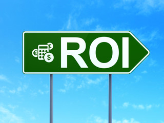 Business concept: ROI and Calculator on road sign background