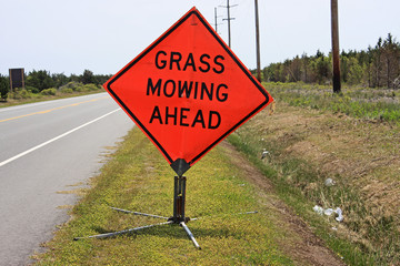 grass mowing sign