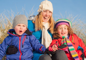 young family in winter clothing