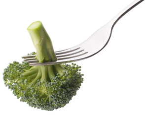 Broccoli on fork isolated on white background cutout. Healthy ea