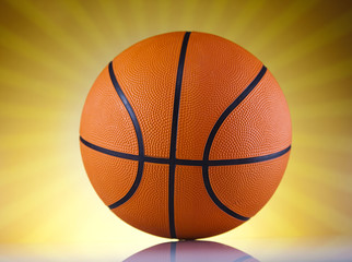 Fototapeta premium Basketball ball over sunshine