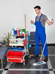 Young Man With Cleaning Equipment