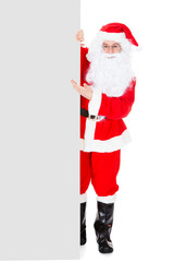Portrait of a santa holding blank placard