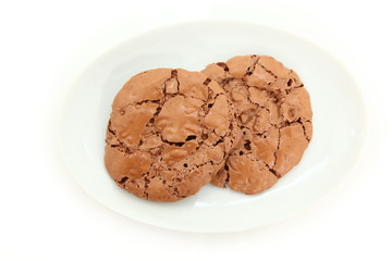 Top Down View Of Chocolate Chewy Cookies On Plate