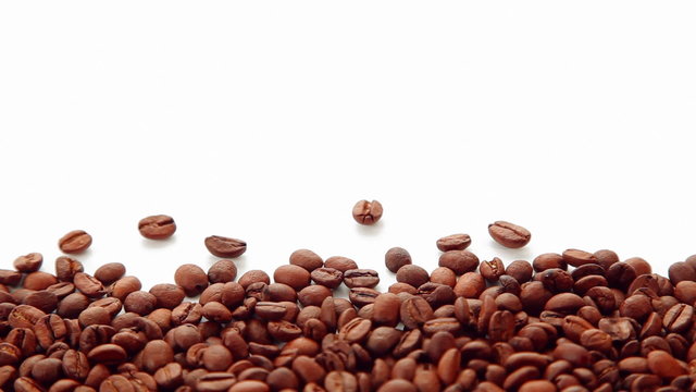 Coffee beans on white background with space for text