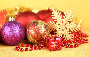 Christmas decorations on yellow background
