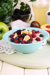 Oatmeal in plate with berries