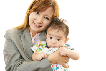 Obraz na płótnie Canvas 赤ちゃんと笑顔の母親