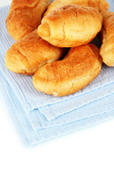 Tasty croissants on napkin close-up