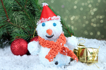 Beautiful snowman and Christmas decor, on bright background